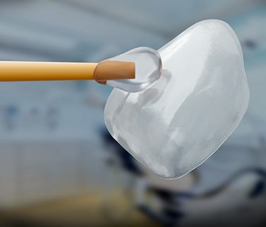 A 3D illustration of a dental veneer and an applicator