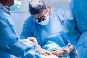 Dentist operating on patient. 
