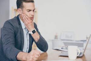 Man in with a toothache while working overseas